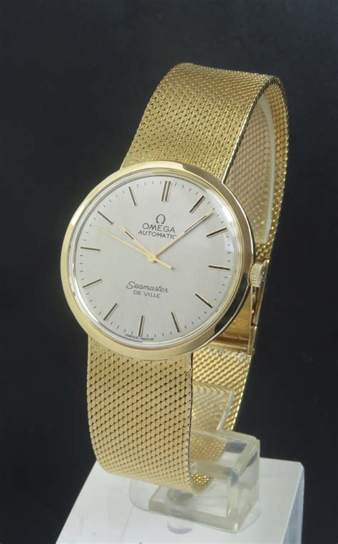 solid gold gents omega watches